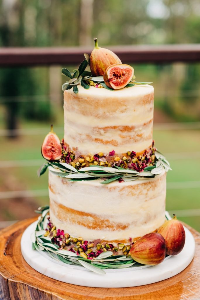 Wedding Cake Texture with figs on top of it