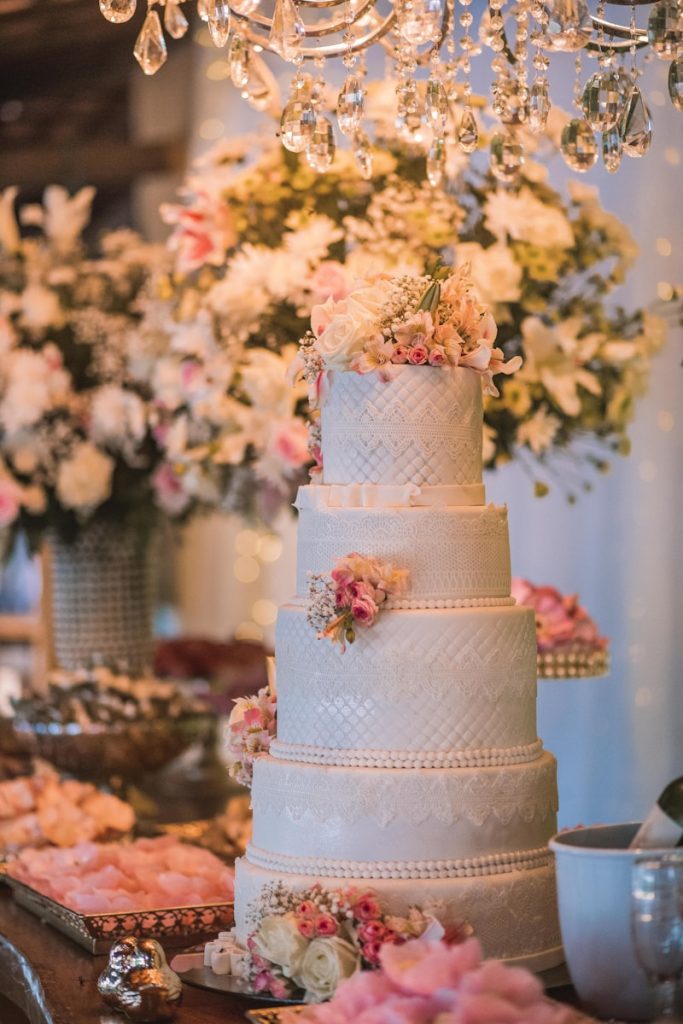 white and pink floral wedding cake